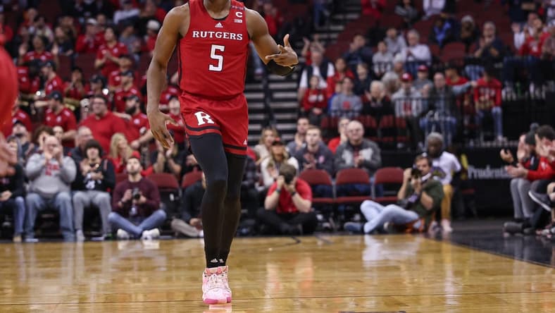Dec 23, 2023; Newark, NY, USA; Rutgers Scarlet Knights forward Aundre Hyatt (5) reacts after a three point basket during the first half against the Mississippi State Bulldogs at Prudential Center. Mandatory Credit: Vincent Carchietta-USA TODAY Sports