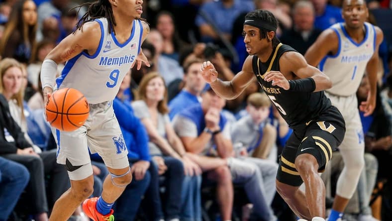 Memphis' Caleb Mills (9) prepares to drive to the basket during the game between Vanderbilt University and University of Memphis at FedExForum in Memphis, Tenn., on Saturday, December 23, 2023.