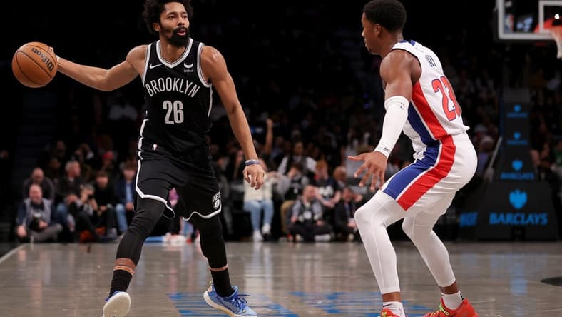 Dec 23, 2023; Brooklyn, New York, USA; Brooklyn Nets guard Spencer Dinwiddie (26) looks to pass the ball against Detroit Pistons guard Jaden Ivey (23) during the second quarter at Barclays Center. Mandatory Credit: Brad Penner-USA TODAY Sports