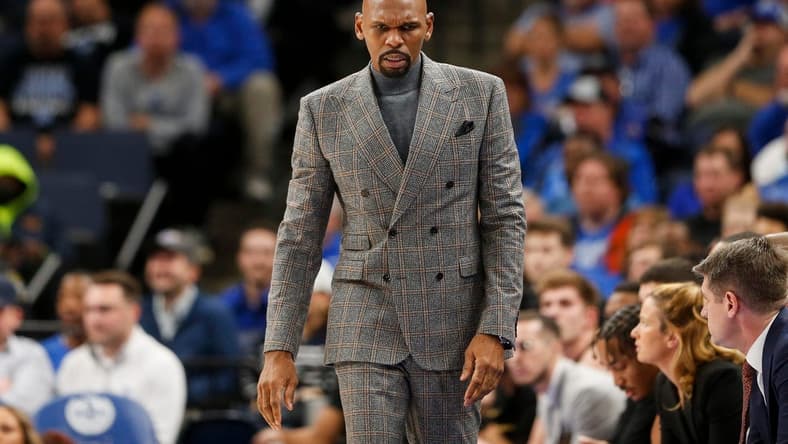 Vanderbilt's head coach Jerry Stackhouse looks down while watching his team on offense during the game between Vanderbilt University and University of Memphis at FedExForum in Memphis, Tenn., on Saturday, December 23, 2023.