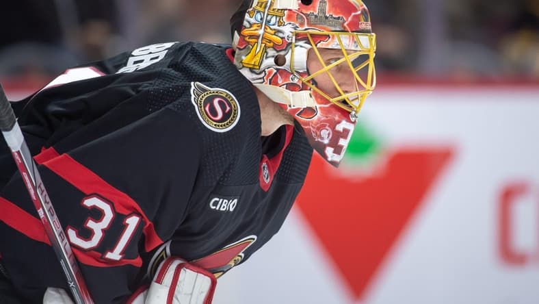 Dec 23, 2023; Ottawa, Ontario, CAN; Ottawa Senators goalie Anton Forsberg (31) looks up the ice prior to the start of the second period against the Pittsburgh Penguins at the Canadian Tire Centre. Mandatory Credit: Marc DesRosiers-USA TODAY Sports