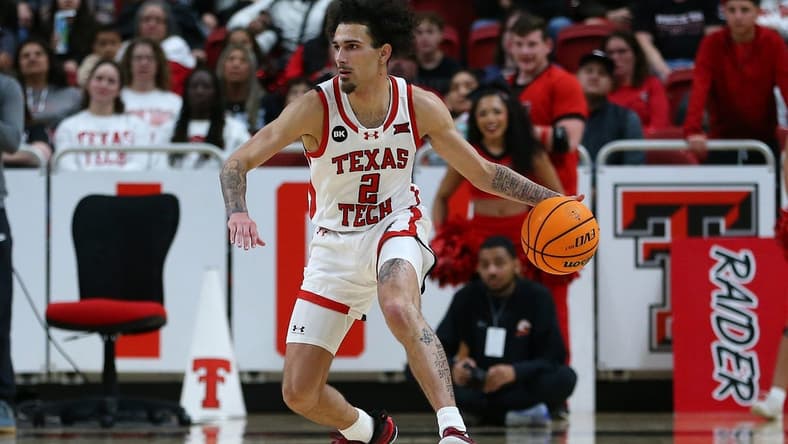 Dec 21, 2023; Lubbock, Texas, USA; Texas Tech Red Raiders guard Pop Isaacs (2) dribbles the ball against the Texas-Arlington Mavericks in the first half at United Supermarkets Arena. Mandatory Credit: Michael C. Johnson-USA TODAY Sports