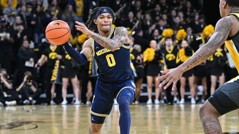 Dec 10, 2023; Iowa City, Iowa, USA; Michigan Wolverines guard Dug McDaniel (0) in action during the game against the Iowa Hawkeyes at Carver-Hawkeye Arena. Mandatory Credit: Jeffrey Becker-USA TODAY Sports
