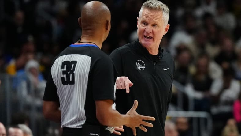 Dec 25, 2023; Denver, Colorado, USA; Golden State Warriors head coach Steve Kerr talks to referee Michael Smith (38) in the second half against the Denver Nuggets at Ball Arena. Mandatory Credit: Ron Chenoy-USA TODAY Sports