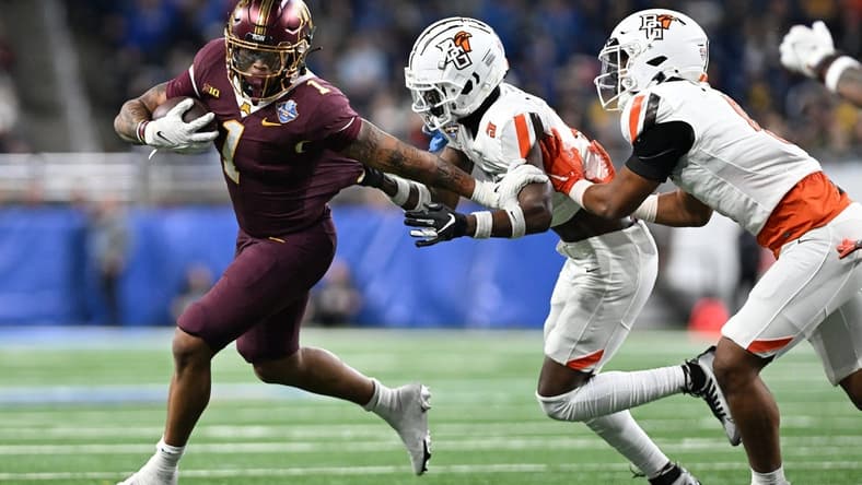 Dec 26, 2023; Detroit, MI, USA; Minnesota Golden Gophers running back Darius Taylor (1) runs the ball against the Bowling Green Falcons in the first quarter at Ford Field. Mandatory Credit: Lon Horwedel-USA TODAY Sports