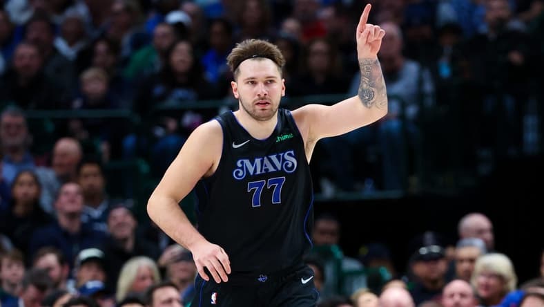 Dec 27, 2023; Dallas, Texas, USA;  Dallas Mavericks guard Luka Doncic (77) reacts after scoring during the first quarter against the Cleveland Cavaliers at American Airlines Center. Mandatory Credit: Kevin Jairaj-USA TODAY Sports