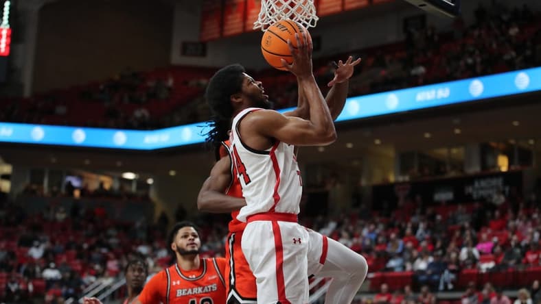 Dec 28, 2023; Lubbock, Texas, USA; Texas Tech Red Raiders guard Kerwin Walton (24) goes to the basket against the Sam Houston Bearkats in the first half at United Supermarkets Arena. Mandatory Credit: Michael C. Johnson-USA TODAY Sports