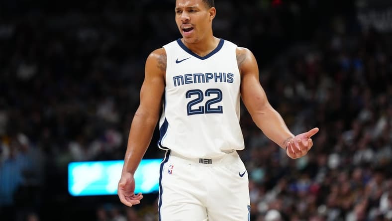 Dec 28, 2023; Denver, Colorado, USA; Memphis Grizzlies guard Desmond Bane (22) reacts in the second half against the Denver Nuggets at Ball Arena. Mandatory Credit: Ron Chenoy-USA TODAY Sports