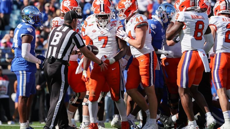 Dec 29, 2023; Jacksonville, FL, USA; Clemson Tigers running back Phil Mafah (7) runs the ball into the end zone for a touchdown against the Kentucky Wildcats in the second quarter during the Gator Bowl at EverBank Stadium. Mandatory Credit: Nathan Ray Seebeck-USA TODAY Sports