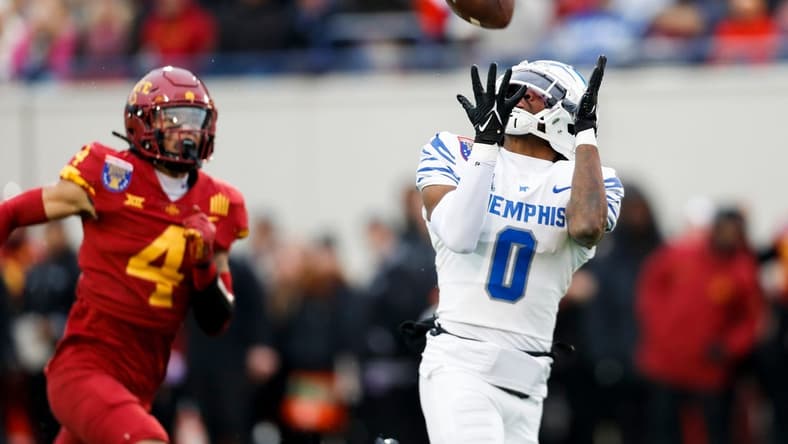 Memphis' Demeer Blankumsee (0) catches a pass for a touchdown in the opening drive during the game between the University of Memphis and Iowa State University in the AutoZone Liberty Bowl at Simmons Bank Liberty Stadium on Dec. 29, 2023.