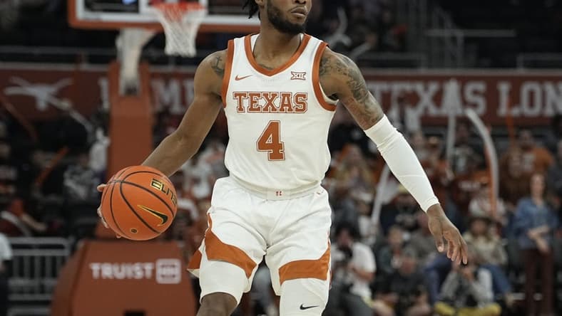 Dec 29, 2023; Austin, Texas, USA; Texas Longhorns guard Tyrese Hunter (4) dribbles during the first half against UNC Greensboro at Moody Center. Mandatory Credit: Scott Wachter-USA TODAY Sports