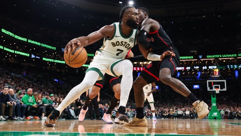 Dec 29, 2023; Boston, Massachusetts, USA; Boston Celtics forward Jaylen Brown (7) drives to the basket during the first half against the Toronto Raptors at TD Garden. Mandatory Credit: Paul Rutherford-USA TODAY Sports