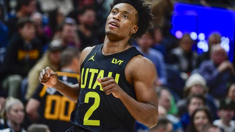 Dec 31, 2022; Salt Lake City, Utah, USA; Utah Jazz guard Collin Sexton (2) runs down court against the Miami Heat during the second half at Vivint Arena. Mandatory Credit: Christopher Creveling-USA TODAY Sports