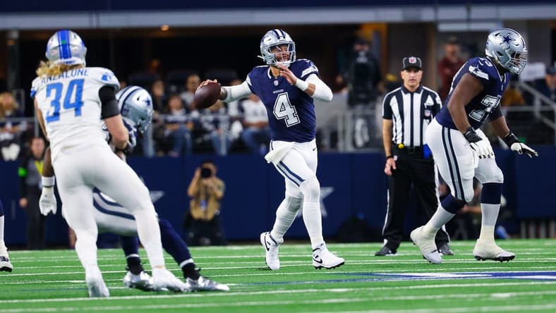 Dec 30, 2023; Arlington, Texas, USA; Dallas Cowboys quarterback Dak Prescott (4) looks to throw during the first half against the Detroit Lions at AT&T Stadium. Mandatory Credit: Kevin Jairaj-USA TODAY Sports