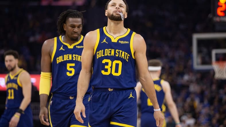 Dec 30, 2023; San Francisco, California, USA; Golden State Warriors guard Stephen Curry (30) reacts after missing a 3-point basket attempt against the Dallas Mavericks during the first quarter at Chase Center. Mandatory Credit: D. Ross Cameron-USA TODAY Sports