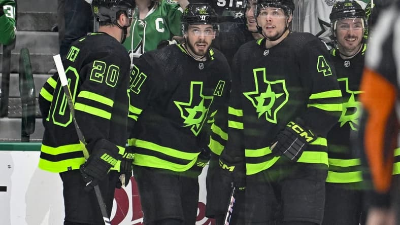 Dec 31, 2023; Dallas, Texas, USA; Dallas Stars center Tyler Seguin (91) and left wing Mason Marchment (27) and defenseman Miro Heiskanen (4) and center Matt Duchene (95) celebrates a goal scored by Seguin against the Chicago Blackhawks during the first period at the American Airlines Center. Mandatory Credit: Jerome Miron-USA TODAY Sports