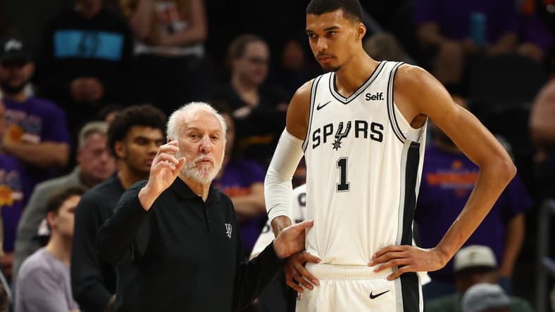 San Antonio Spurs: San Antonio Spurs coach Gregg Popovich with center Victor Wembanyama
