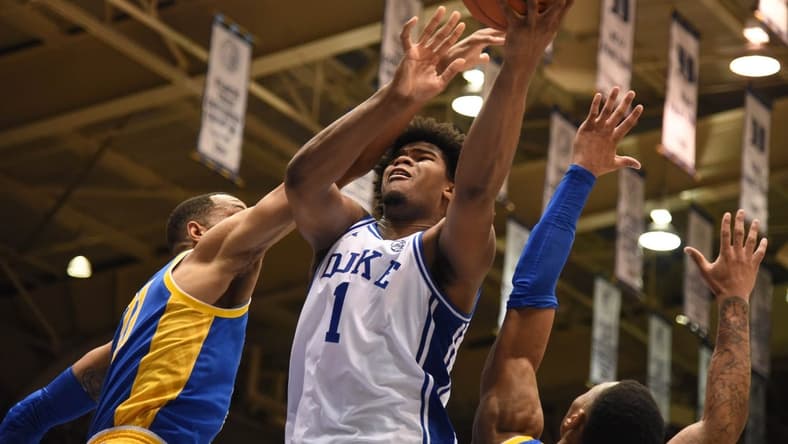 Jan 28, 2020; Durham, North Carolina, USA; Duke Blue Devils center Vernon Carey Jr. (1) shoots over Pitt Panthers forward Terrell Brown (21) during the second half at Cameron Indoor Stadium. Mandatory Credit: Rob Kinnan-USA TODAY Sports