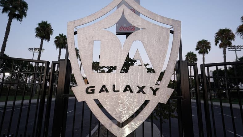 Aug 26, 2020; Carson, California, USA; A general view of LA Galaxy logo at the locked gates at Dignity Health Sports Park after the MLS game against the Seattle Sounders was postponed have been postponed in the wake of protests following the police shooting of Jacob Blake in Kenosha, Wisconsin. Mandatory Credit: Kirby Lee-USA TODAY Sports