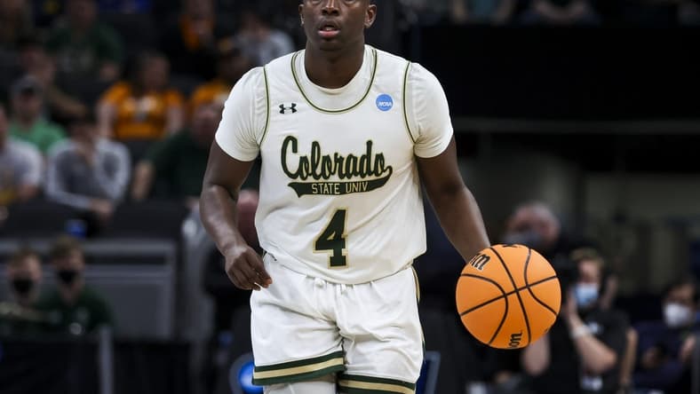 Mar 17, 2022; Indianapolis, IN, USA; Colorado State Rams guard Isaiah Stevens (4) controls the ball against the Michigan Wolverines in the first half during the first round of the 2022 NCAA Tournament at Gainbridge Fieldhouse. Mandatory Credit: Trevor Ruszkowski-USA TODAY Sports