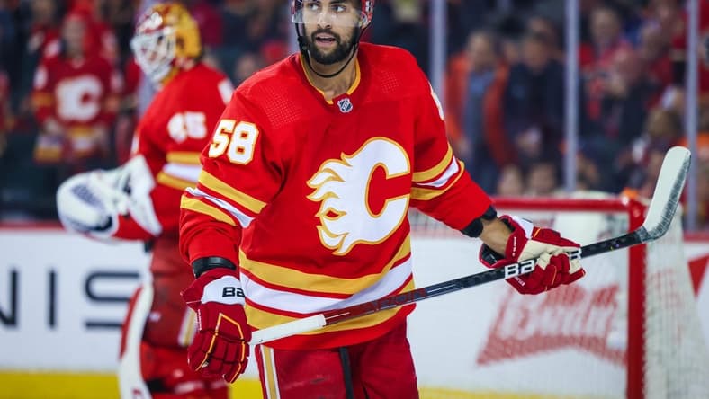 Calgary Flames defenseman Oliver Kylington (58) skates against the Edmonton Oilers during the second period in game two of the second round of the 2022 Stanley Cup Playoffs at Scotiabank Saddledome. Mandatory Credit: Sergei Belski-USA TODAY Sports