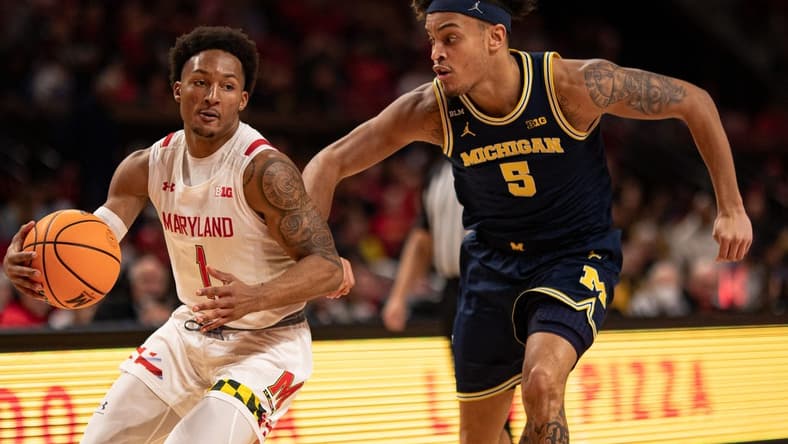 Jan 19, 2023; College Park, Maryland, USA; Maryland Terrapins guard Jahmir Young (1) makes a move to the basket a Michigan Wolverines forward Terrance Williams II (5) defends during the second half at Xfinity Center. Mandatory Credit: Tommy Gilligan-USA TODAY Sports