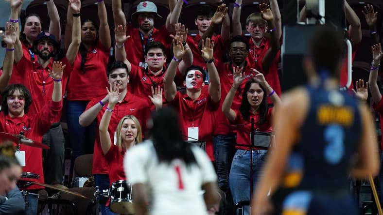 Mar 4, 2023; Uncasville, CT, USA; The St. John's Red Storm band shows support for guard Unique Drake (1) as she throws a free-throw against the Marquette Golden Eagles in the second half at Mohegan Sun Arena. Mandatory Credit: David Butler II-USA TODAY Sports