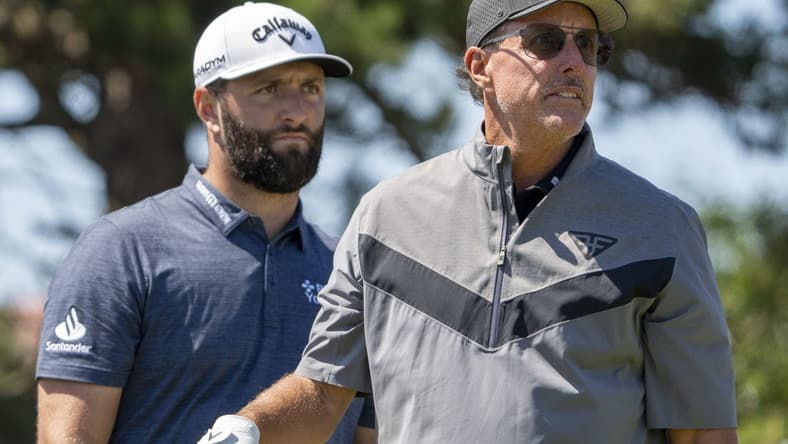Jon Rahm joined LIV Golf, Phil Mickelson (right) believes the move could be a bridge between the well-funded upstart circuit to the PGA Tour. Mandatory Credit: Kyle Terada-USA TODAY Sports