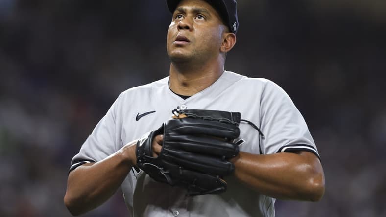 Aug 13, 2023; Miami, Florida, USA; New York Yankees relief pitcher Wandy Peralta (58) looks on as he leaves the game against the Miami Marlins during the eighth inning at loanDepot Park. Mandatory Credit: Sam Navarro-USA TODAY Sports