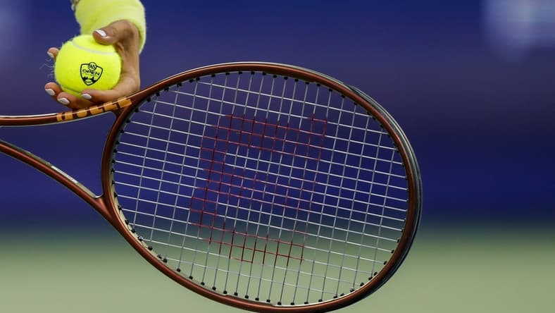 Aug 18, 2023; Mason, OH, USA; A detail view of the ball as Ons Jabeur (TUN) prepares to serve against Aryna Sabalenka during the Western and Southern Open tennis tournament at Lindner Family Tennis Center. Mandatory Credit: Katie Stratman-USA TODAY Sports