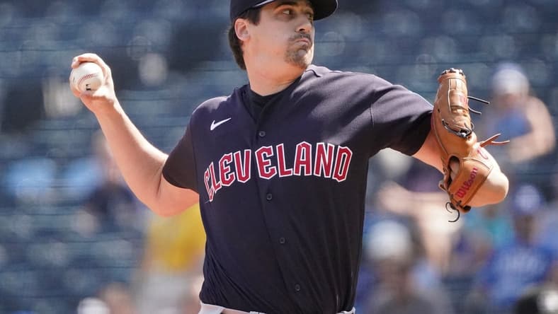 Sep 18, 2023; Kansas City, Missouri, USA; Cleveland Guardians starting pitcher Cal Quantrill (47) delivers against the Kansas City Royals in the first inning at Kauffman Stadium. Mandatory Credit: Denny Medley-USA TODAY Sports