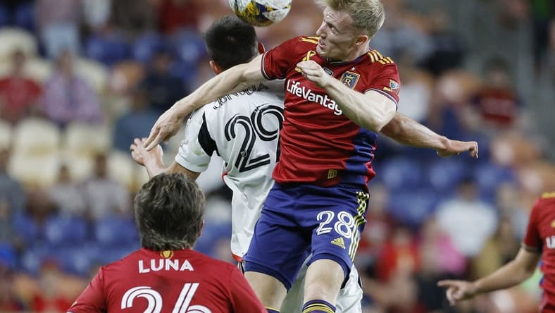 Sep 20, 2023; Sandy, Utah, USA; Real Salt Lake defender Jasper Loffelsend (28) and FC Dallas defender Sam Junqua (29) battle in the second half at America First Field. Mandatory Credit: Jeff Swinger-USA TODAY Sports