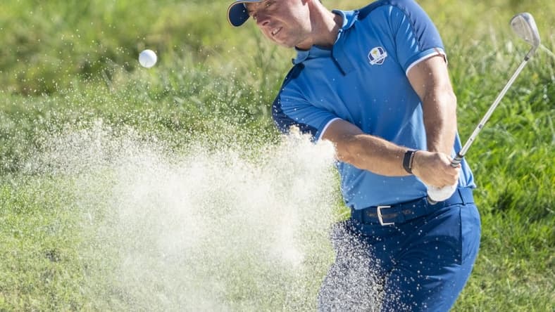 September 27, 2023; Rome, ITA; Team Europe golfer Rory McIlroy hits his bunker shot on the 16th hole during a practice day for the Ryder Cup golf competition at Marco Simone Golf and Country Club. Mandatory Credit: Kyle Terada-USA TODAY Sports