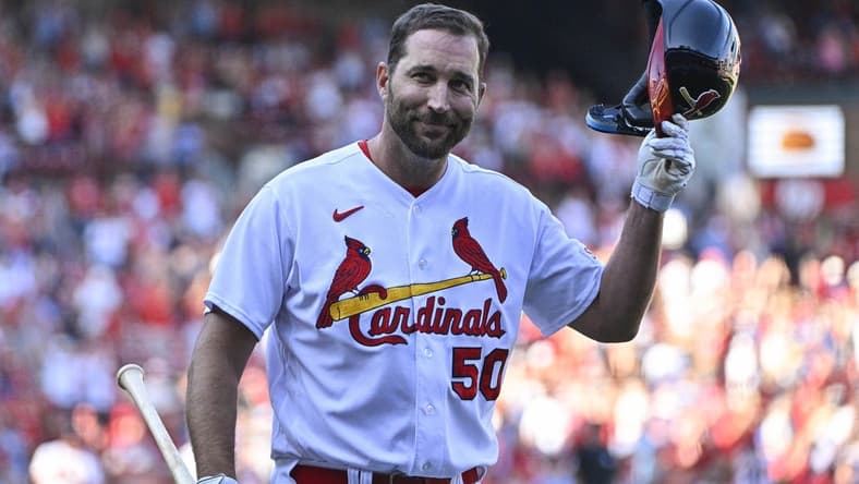 Oct 1, 2023; St. Louis, Missouri, USA; St. Louis Cardinals pinch hitter Adam Wainwright (50) tips his cap as he receives a standing ovation after his final at bat during the eighth inning against the Cincinnati Reds at Busch Stadium. Mandatory Credit: Jeff Curry-USA TODAY Sports