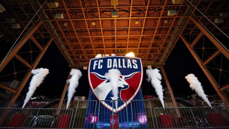Oct 4, 2023; Frisco, Texas, USA; A view of the FC Dallas logo and smoke and flames before the game between FC Dallas and the Colorado Rapids at Toyota Stadium. Mandatory Credit: Jerome Miron-USA TODAY Sports