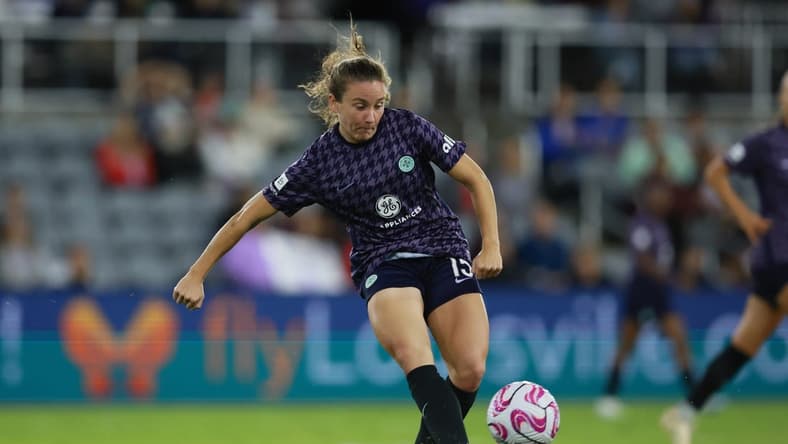 Oct 6, 2023; Louisville, Kentucky, USA; Racing Louisville FC defender Julia Lester (15) passes the ball in the second half against the Orlando Pride at Lynn Family Stadium. Mandatory Credit: EM Dash-USA TODAY Sports