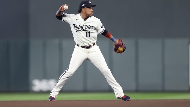Oct 11, 2023; Minneapolis, Minnesota, USA; Minnesota Twins second baseman Jorge Polanco (11) throws to first for an out in the eighth inning against the Houston Astros during game four of the ALDS for the 2023 MLB playoffs at Target Field. Mandatory Credit: Jesse Johnson-USA TODAY Sports