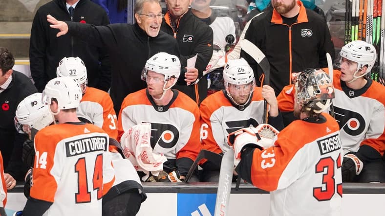 Nov 7, 2023; San Jose, California, USA; Philadelphia Flyers head coach John Tortorella instructs goaltender Samuel Ersson (33) during the third period against the San Jose Sharks at SAP Center at San Jose. Mandatory Credit: Robert Edwards-USA TODAY Sports