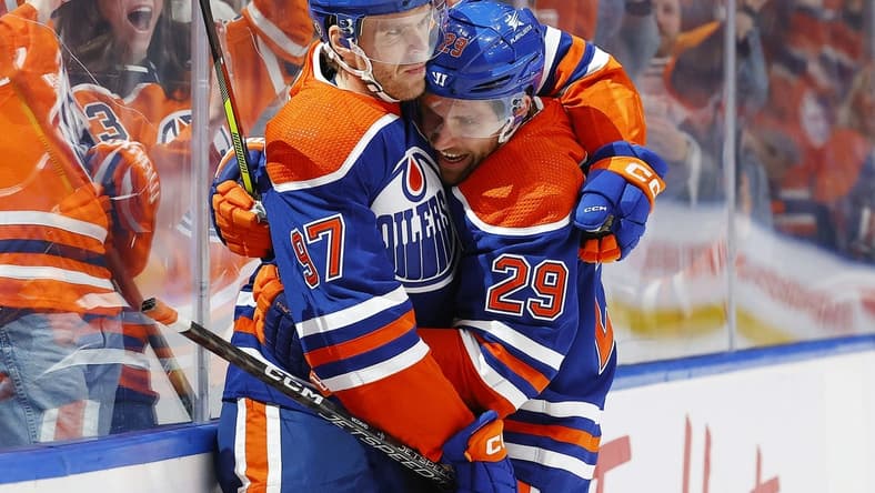 Nov 13, 2023; Edmonton, Alberta, CAN; Edmonton Oilers forward Connor McDavid (97) celebrates his goal with center Leon Draisaitl (29) during the third period against the New York Islanders at Rogers Place. Mandatory Credit: Perry Nelson-USA TODAY Sports
