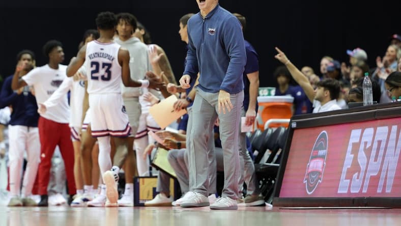 Nov 24, 2023; Kissimmee, FL, USA; Florida Atlantic Owls head coach Dusty May calls to his team against the Texas A&M Aggies in the second half during the ESPN Events Invitational Semifinals at State Farm Field House. Mandatory Credit: Nathan Ray Seebeck-USA TODAY Sports