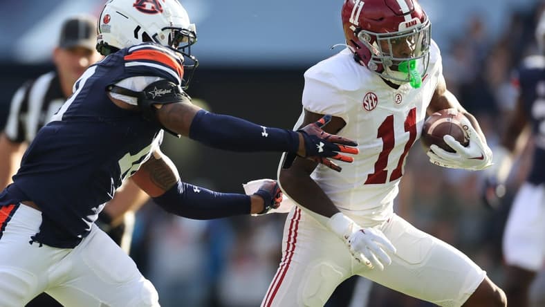 Nov 25, 2023; Auburn, Alabama, USA; Auburn Tigers safety Zion Puckett (10) closes in on Alabama Crimson Tide wide receiver Malik Benson (11) during the first quarter at Jordan-Hare Stadium. Mandatory Credit: John Reed-USA TODAY Sports