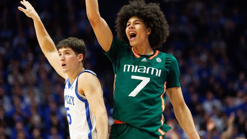Nov 28, 2023; Lexington, Kentucky, USA; Miami (Fl) Hurricanes guard Kyshawn George (7) reacts after making a basket during the first half against the Kentucky Wildcats at Rupp Arena at Central Bank Center. Mandatory Credit: Jordan Prather-USA TODAY Sports