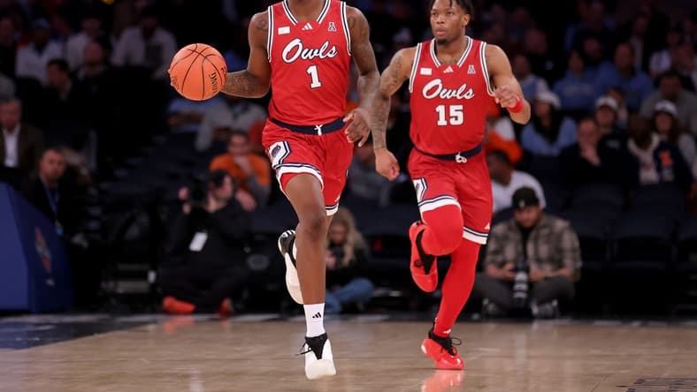 Dec 5, 2023; New York, New York, USA; Florida Atlantic Owls guard Johnell Davis (1) brings the ball up court against the Illinois Fighting Illini with guard Alijah Martin (15) during the second half at Madison Square Garden. Mandatory Credit: Brad Penner-USA TODAY Sports
