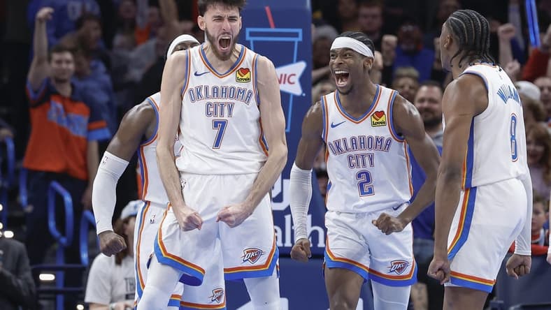 Dec 8, 2023; Oklahoma City, Oklahoma, USA; Oklahoma City Thunder forward Chet Holmgren (7), and guard Shai Gilgeous-Alexander (2) celebrate after Chet Holmgren scores a basket against the Golden State Warriors during the second half at Paycom Center. Mandatory Credit: Alonzo Adams-USA TODAY Sports
