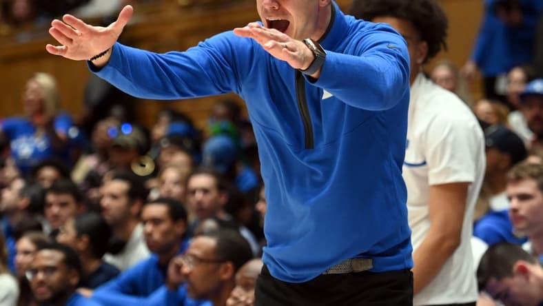 Dec 9, 2023; Durham, North Carolina, USA; Duke Blue Devils head coach Jon Scheyer reacts to a call during the second half against the Charlotte 49ers at Cameron Indoor Stadium. Mandatory Credit: Rob Kinnan-USA TODAY Sports