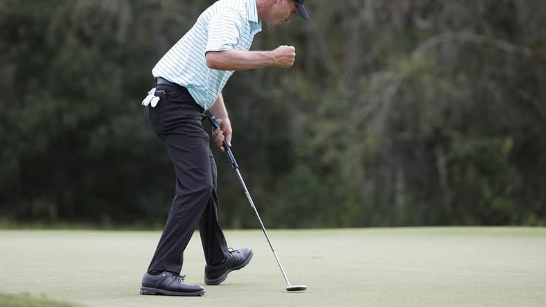 Dec 10, 2023; Bradenton, Florida, USA; Team International s Steven Alker reacts to an eagle putt on the eighth hole during their afternoon round at The Concession Golf Club. Mandatory Credit: Jeff Swinger-USA TODAY Sports