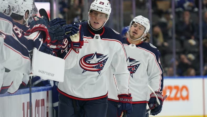 Dec 14, 2023; Toronto, Ontario, CAN; Columbus Blue Jackets forward Patrik Laine (29) gets congratulated after scoring against the Toronto Maple Leafs during the first period at Scotiabank Arena. Mandatory Credit: John E. Sokolowski-USA TODAY Sports