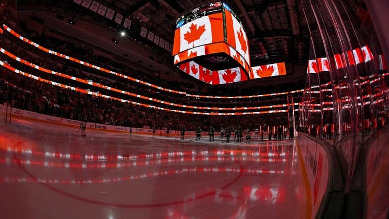 Dec 15, 2023; Dallas, Texas, USA; A view of the Canadian flag during the playing of the national anthem of Canada before the game between the Dallas Stars and the Ottawa Senators at the American Airlines Center. Mandatory Credit: Jerome Miron-USA TODAY Sports