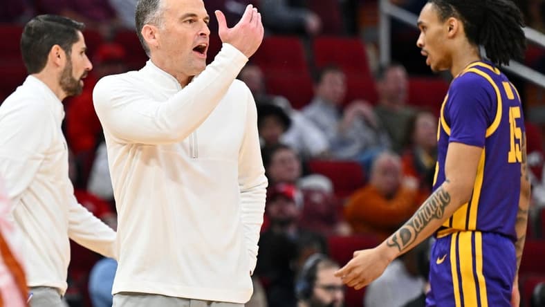 Dec 16, 2023; Houston, Texas, USA; LSU Tigers head coach Matt McMahon gestures to players against the Texas Longhorns during the second half at Toyota Center. Mandatory Credit: Maria Lysaker-USA TODAY Sports