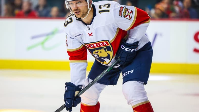 Dec 18, 2023; Calgary, Alberta, CAN; Florida Panthers center Sam Reinhart (13) during the face off against the Calgary Flames during the third period at Scotiabank Saddledome. Mandatory Credit: Sergei Belski-USA TODAY Sports